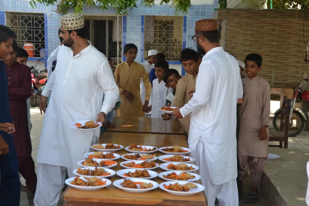 Food distribution at a rural Sindh school, supporting children during the education crisis