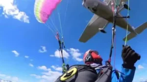 sightseeing-plane-crashes-into-paraglider-mid-air-video
